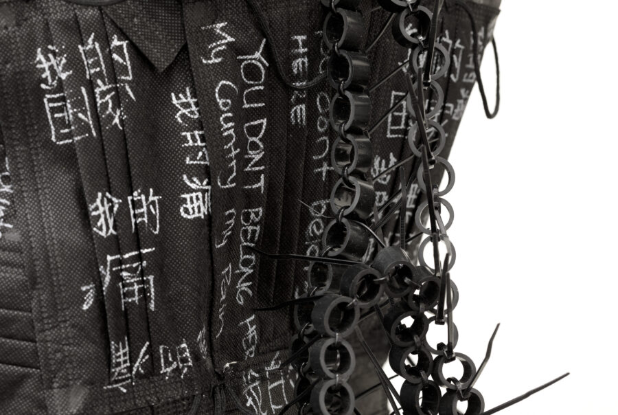 Credit_ Elina Simbolon, My Country Is My Pain, 2020-2021, Cheongsam - cotton fabric, black mask, white marker, Object of trauma - flex pipe, cable ties(1)